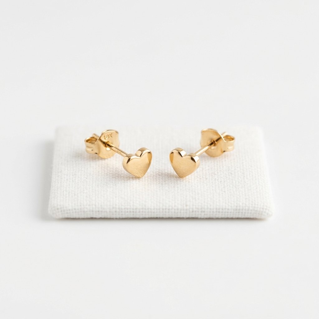 Aretes corazón de oro 18K